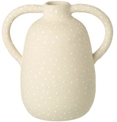 A stunning cream vase with white painted polka dots.