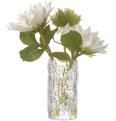 This bold and beautiful flower and vase ornament is a great way to add a fresh touch to the home. 