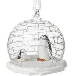 Embrace the magic of the season with our Glass bauble With Penguins