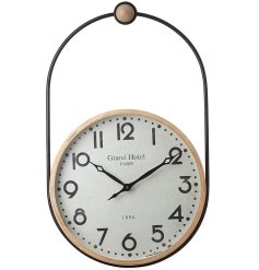 Stunning vintage clock in a natural wood and black hanging frame
