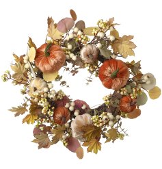 A beautifully coloured and textured autumnal wreath featuring velvet pumpkins and artificial berries. 