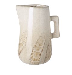 A beautiful jug in a neutral tone with a cream glaze