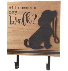 A chic wooden wall plaque with two hooks in a dog walk design.
