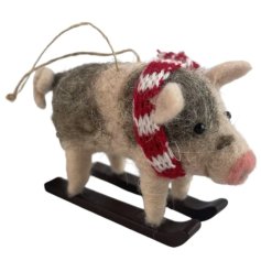 Add some festive fun to your tree with this cute little pig.