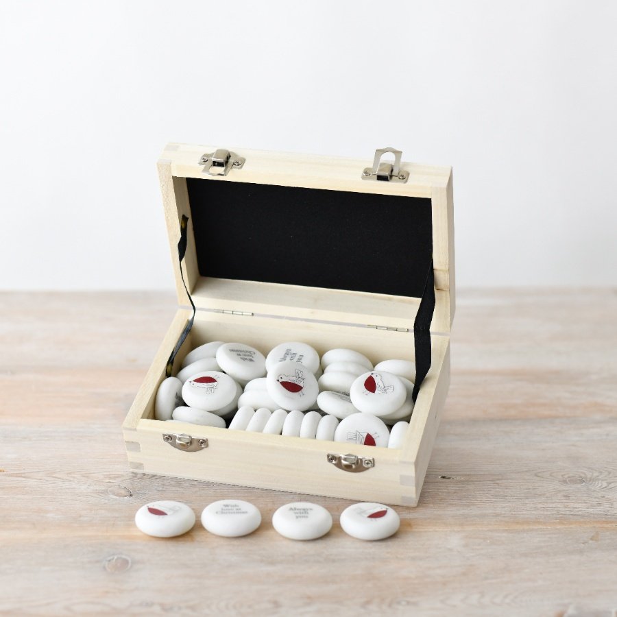 Assorted sentimental marble pebbles, ideal for uplifting gifts.