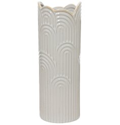 Tall  cream vase that is beautifully captivating.