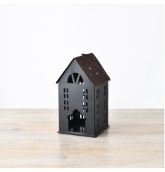  Add a touch of sophistication to your home with our Black Metal House ornament with hanging hoop. 