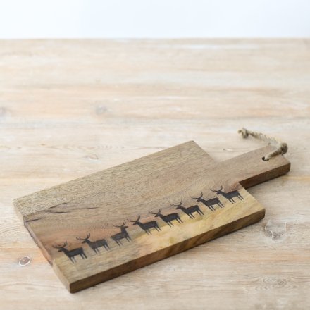 This wooden board can be used as a beautiful serving tray. 