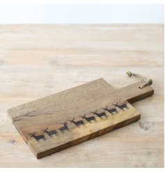 This wooden board can be used as a beautiful serving tray. 
