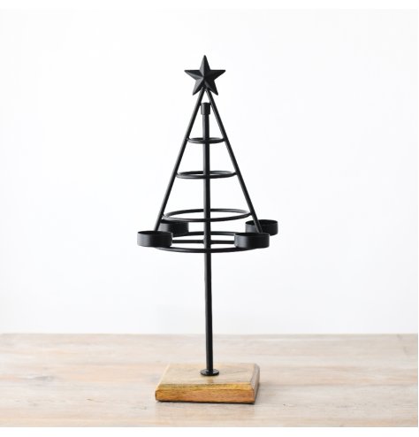 Illuminate your Christmas decor with the sleek black design of this tree-shaped tea light holder,