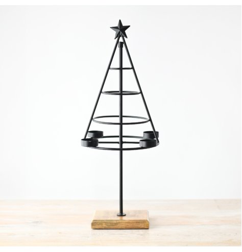 Spread holiday cheer in your living room with this elegant tabletop candle holder shaped like a Christmas tree!