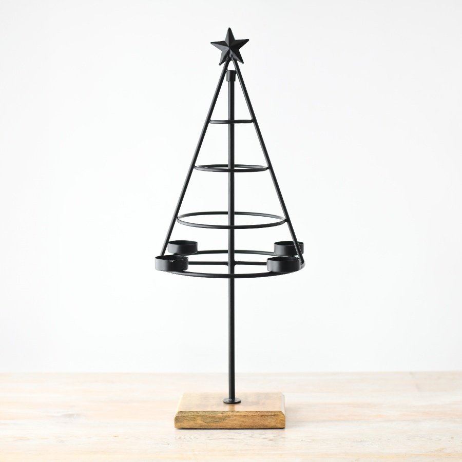 Spruce up your living room with an elegant candle holder in the shape of a Christmas tree. 