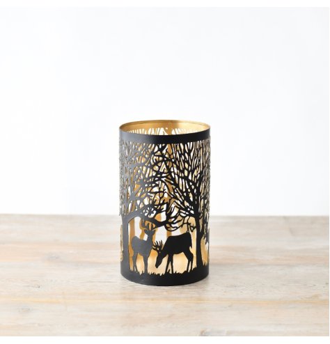 Get into the holiday spirit with this beautiful reindeer candle holder.