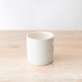 "Add a touch of elegance to your home decor or gift a charming surprise with this rabbit-shaped candle holder. Ideal f