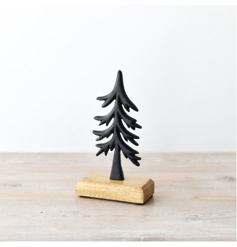 Create a magical Christmas scene with this black tree ornament. 