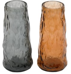A glass vase with a log effect design in a burnt orange and grey colour.