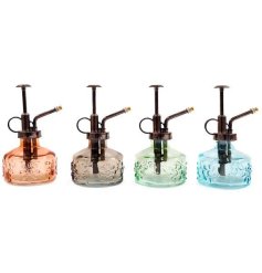 A coloured plant water spray bottle in 4 assorted designs.