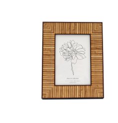 A chic photo frame with a wood panelling detail. 