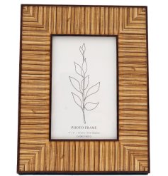 Create a boho space with this panelled photo frame made from wood. 
