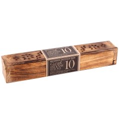 An antique wooden incense box containing 10 incense sticks 