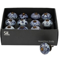 A stylish blue and white patterned door knobs