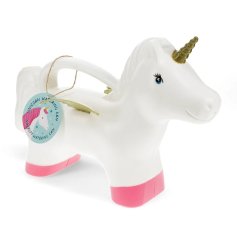 A funky unicorn style watering can in white with pink feet with a golden horn. 
