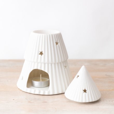 A simple yet elegant oil burner in a Christmas tree design with mini cut out stars