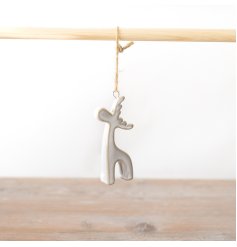 This adorable reindeer would be a super cute addition to any festive decor!