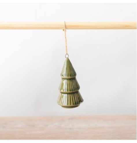 This hanging tree decoration captivates the true magic of Christmas decor. 