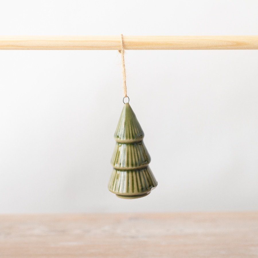 Add a classic touch to the Christmas decor with this green glazed hanging tree decoration.