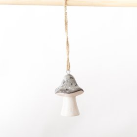 Infuse woodland charm into your home decor with this delightful mushroom hanger. A whimsical touch for any space
