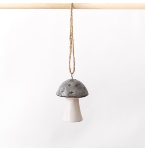 Infuse your space with natural charm using our Ceramic Mushroom Decoration in Grey. Perfect for adding a rustic touch