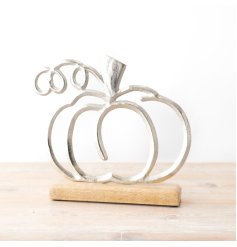 A charming pumpkin decoration with a rustic wooden base.