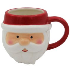 Ger in the Christmas Spirt with this cute Santa head mug