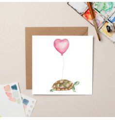 A charming Greeting card featuring a Tortoise with heart ballon