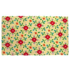 Add a pop of colour to the home with this bright flower design doormat.