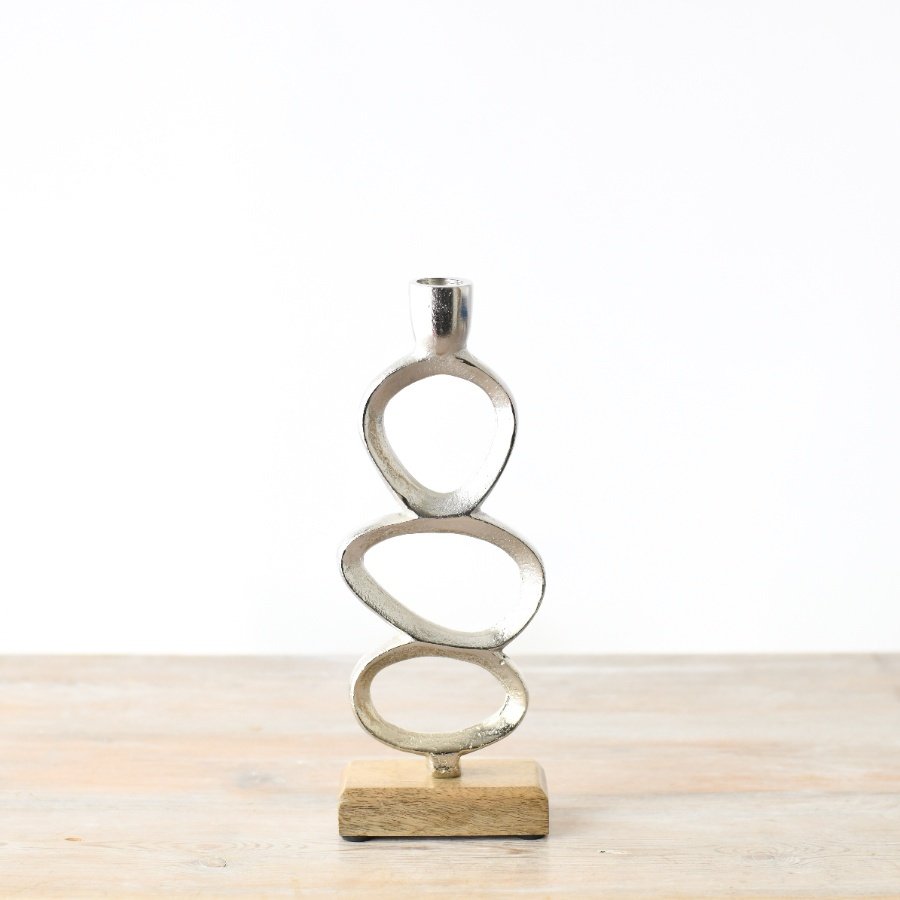 Add this chrome detail candlestick to any living space.