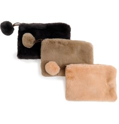 A  plush, multipurpose makeup and accessory bag, featuring an eyecatching furry pom pom