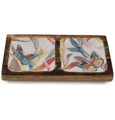 A chic wooden tray detailed with an enamel butterfly pattern.
