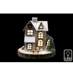 lluminate your home with our LED snow house for a stunning centerpiece.