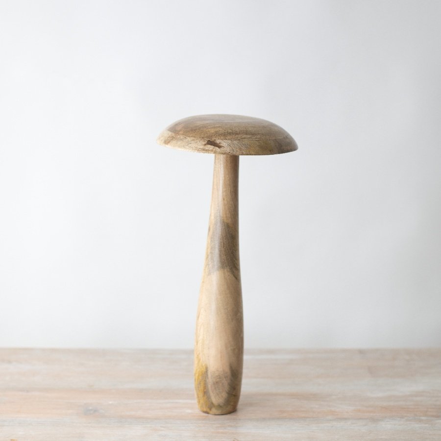 Add an enchanting touch to your home decor with this adorable stand-alone mushroom decoration.