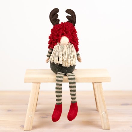 Meet our charming Fabric Sitting Gnome with long legs - the perfect addition to your home decor. 