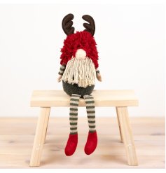 Meet our charming Fabric Sitting Gnome with long legs - the perfect addition to your home decor. 