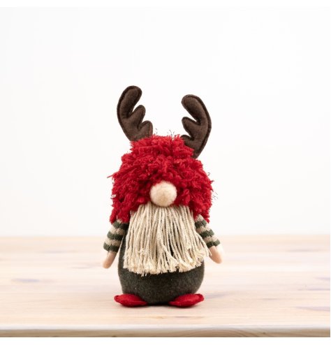 Add some festive charm to your home with our adorable Fabric Sitting Gnome With Antlers, 