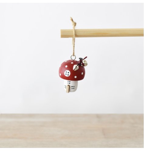 Infuse festive charm into your decor with this whimsical hanging mushroom ornament.