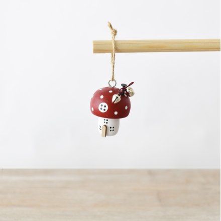 Infuse festive charm into your decor with this whimsical hanging mushroom ornament.