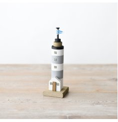 Add a charming touch to your home with our delightful wooden Lighthouse toy. A must-have for every playroom!