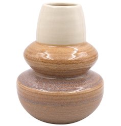 Add a touch of elegance to your abode with this beautiful vase, perfect for any room - from the fireplace to the table
