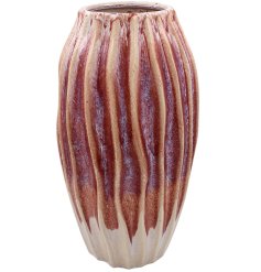 Elevate your home decor with this unique lava vase, crafted to make a stylish statement in any room.