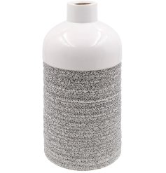 Elevate your space with this striking vase that exudes bold style. Perfect for any interior.
